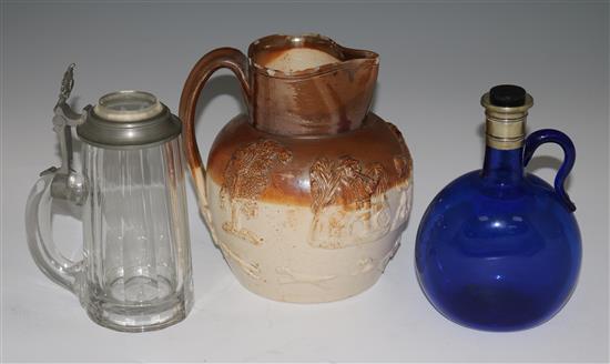 A Bristol blue glass flagon, a pewter mounted stein & a stoneware jug